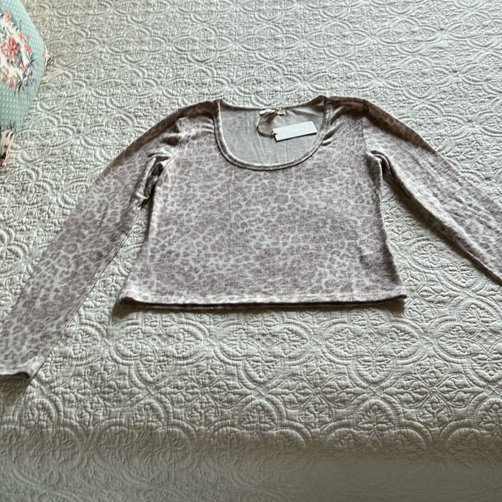 Brand new with tags leopard print long sleeve sweater.